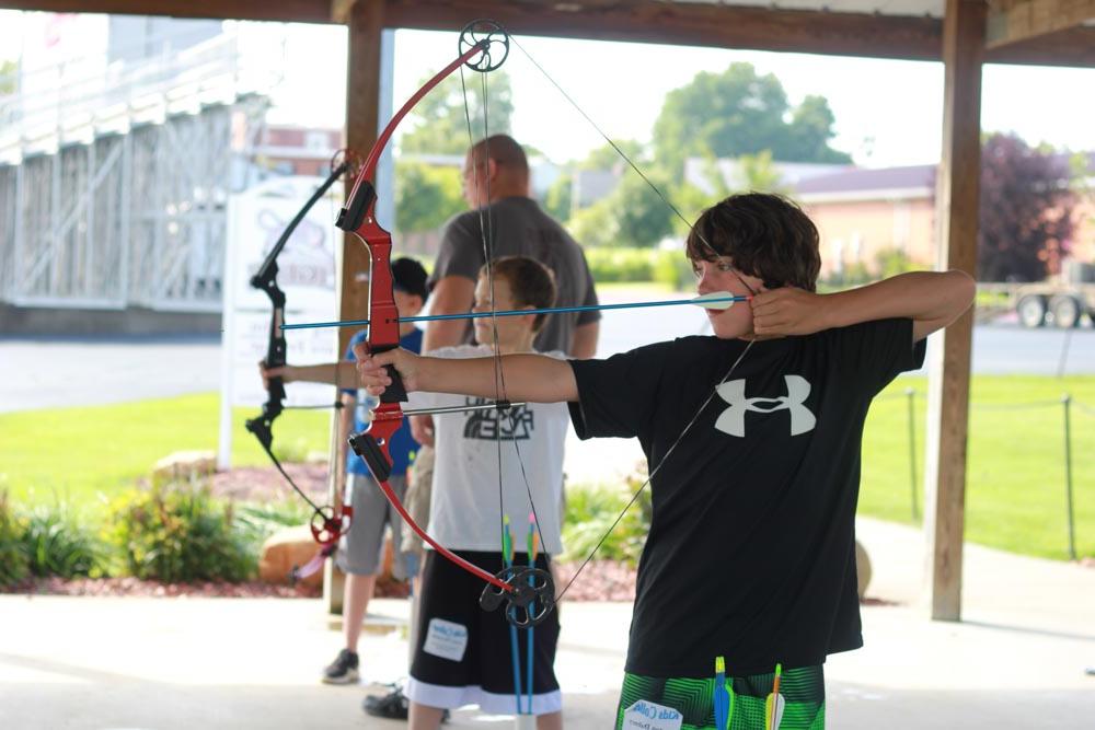 Kid shooting arrow